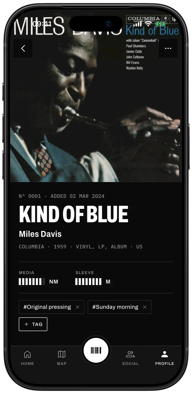 Record page in Sleevewise: Kind of Blue by Miles Davis, Columbia 1959, graded Near Mint (media) and Mint (sleeve), with tags